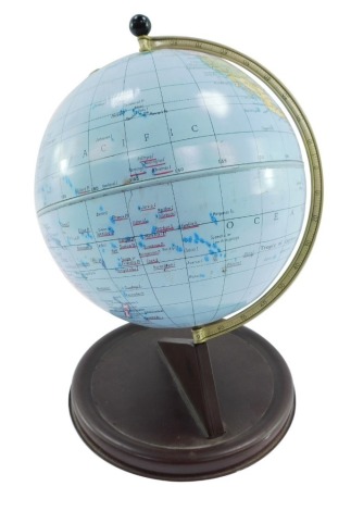 The Chad Valley tin plate terrestrial globe, brown circular tin stand, 29cm high.