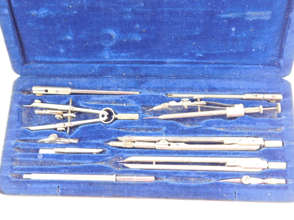 A Dutch scientific instrument and drawing set and three pocket knives ...