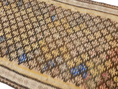 A Caucasian brown ground runner, decorated with vary coloured tree motifs, within geometric borders, 265cm x 97cm. - 3