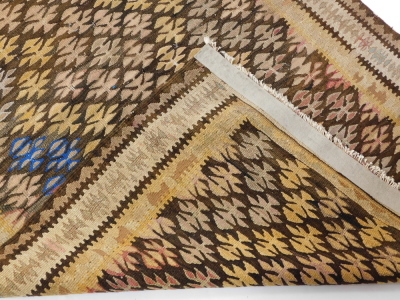 A Caucasian brown ground runner, decorated with vary coloured tree motifs, within geometric borders, 265cm x 97cm. - 4