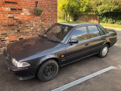 A 1991 Toyota Carina Windsor XL, registration H49 HND, 1.6 litre, petrol, four door saloon, 98,842 recorded miles, MOT to 30th September 2022. To be sold upon instructions from the Executors of Mrs Freda Young (Dec'd) who owned the car since 2013. - 12