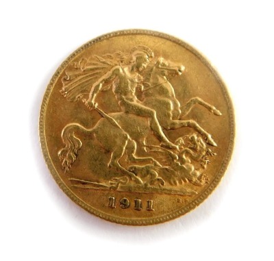 A George V half gold sovereign, dated 1911. - 3