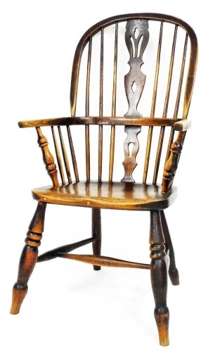 A 19thC ash and elm Windsor chair, with a pierced splat, solid seat on turned legs with H stretcher, 100cm high.
