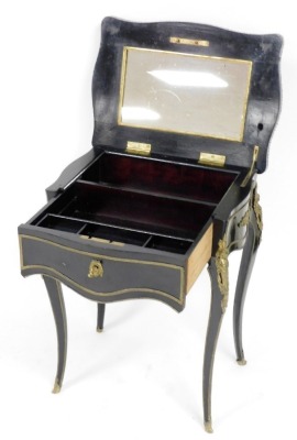 A 19thC Louis XV style ebonised and ormolu mounted ladies dressing table, the Boulle inlaid and shaped hinged top enclosing a mirror back and fitted interior above a frieze drawer, on cabriole legs, 74cm high, 58cm wide, 43cm deep. - 2