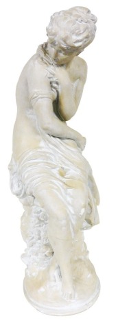 A plaster cast model of a classical lady, scantily clad in a seated position, 62cm high.