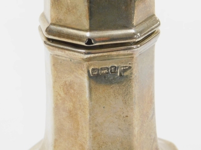 An Edward VII silver sugar castor, with urn shaped finial, pierced sifter and shaped body on a pedestal base, Sheffield 1909, 5¾oz, 21cm high. (AF) - 2