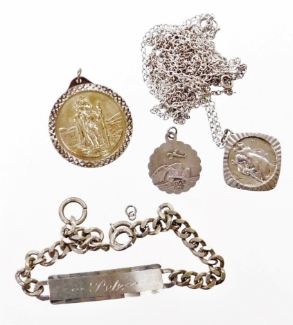 A group of silver jewellery, to include a silver identity bracelet, silver chain, St Christopher pendant inscribed Mark, further St Christopher pendant and an airplane and automobile pendant, 45.4g all in. (AF)