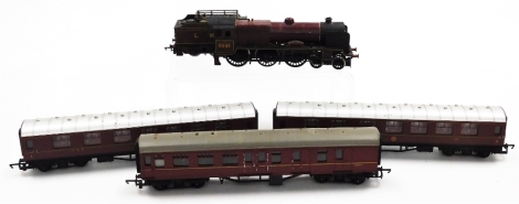 A Hornby Duke of Sutherland locomotive and LMS carriage, together with three other carriages. (5)