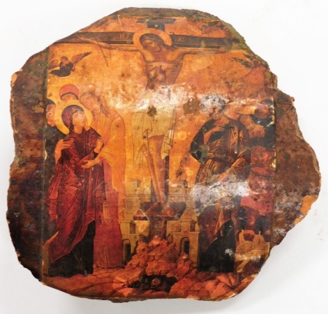 An Eastern European type printed icon of Christ on the cross, on a stoneware body, 16cm high.