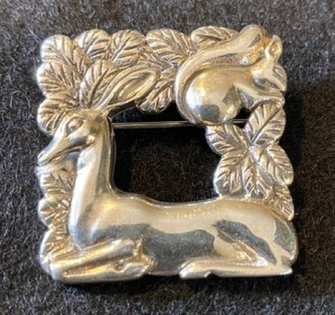 A mid-20thC Danish silver brooch In the style of Georg Jensen, after design no. 318 by Arno Malinowski, stamped Sterling Denmark 1.5" square, selected by TV celebrity Susan Calman. NB. This is a charity lot and there is no Buyers Premium payable. Collect