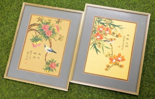 A pair of Chinese pictures on silk, each depicting birds perched on flowering branches, with grey mounts, 36cm x 26cm, framed and glazed. (2)