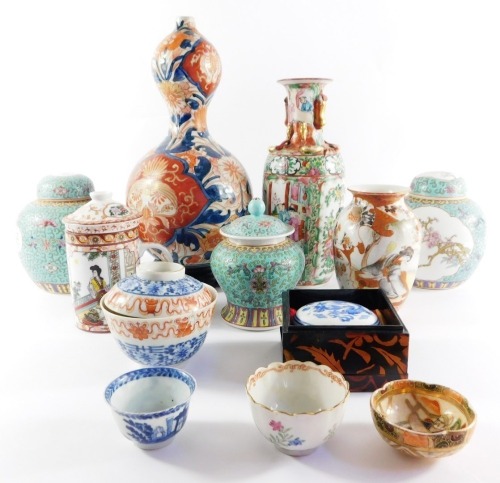 A group of Chinese and Japanese porcelain, including Arita and Imari vases, Chinese turquoise ground ginger jars and covers, rice and tea bowls, etc. (a quantity)