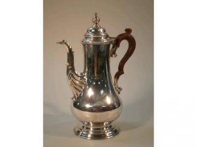 An Elizabeth II silver coffee pot reproduced in the early Georgian manner