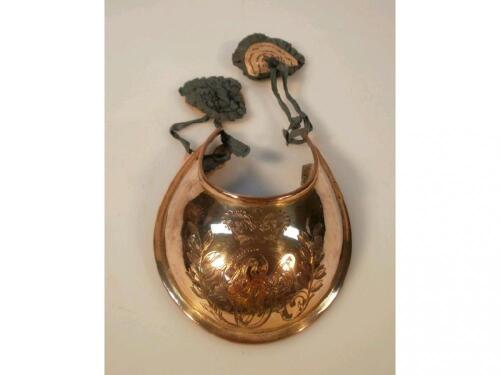 A George III gilt copper officer's gorget