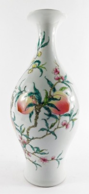 A Chinese porcelain famille rose vase, of baluster form, decorated with peaches and blossom, bears six character Yongzheng mark, 35cm high. - 4