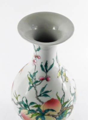 A Chinese porcelain famille rose vase, of baluster form, decorated with peaches and blossom, bears six character Yongzheng mark, 35cm high. - 5