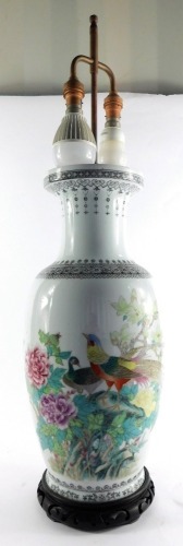 A Chinese Republic famille rose porcelain vase converted to a table lamp, of shouldered ovoid form, decorated with pheasants and peonies, verso script, on a fixed wood stand, vase 50.5cm high.