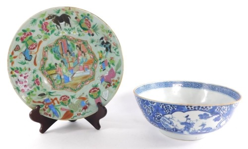 A Chinese porcelain blue and white bowl, decorated with the reserves of figures, and flowers, on a prunus blossom and cracked ice ground, probably 18thC, 26cm diameter, together with a Canton celadon ground dish, decorated centrally with a reserve of ladi