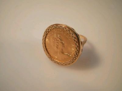 A full sovereign 1974 set in a 9ct gold ring mount