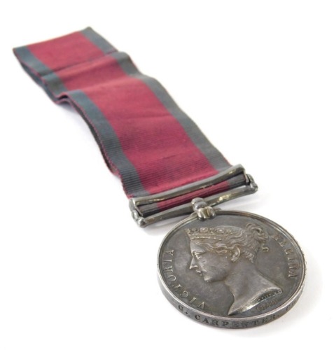 A Queen Victoria 1848 service medal, with bar for Egypt and ribbon, bearing mark G Carpenter Coldstream Guards, 4cm diameter.