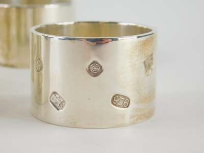 A set of seven Elizabeth II silver napkin rings, by Dawson of Stamford, of plain circular form, Sheffield 2005, 17.8oz. With the option of the next lot at the same price. - 2