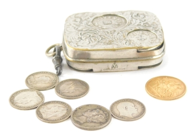 An Edward VII gold half sovereign 1908, five various silver threpenny coins, another and a metal sprung coin case. (a quantity)