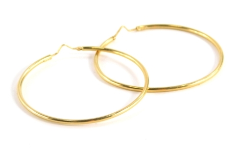 A pair of large hoop earrings, of thin plain design, yellow metal, unmarked, believed to be 9ct gold, 5cm diameter, 3.1g.