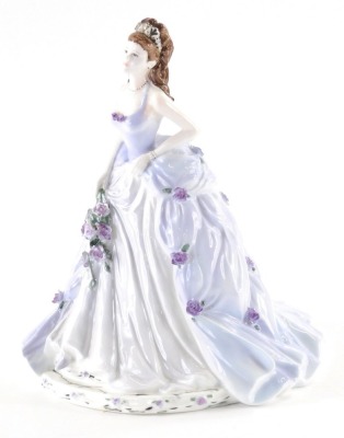 A Coalport English Rose collection 2000 Limited Edition figure, Lilac Time, number 792 of 1000, with certificate, printed marks beneath, 23cm high.