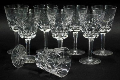 A set of eight Waterford crystal wine glasses, each hobnail cut, on shaped stems and circular feet, marks beneath, 15cm high.