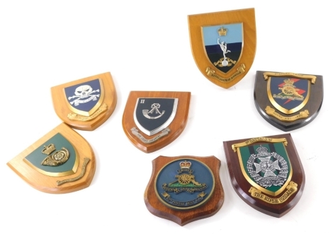 Various oak and other backed military wall plaques, to include Royal Artillery with shield back, display troop with crest, 19cm high, various others, to include The Light Infantry, 17th/21st Lancers, etc. (a quantity)