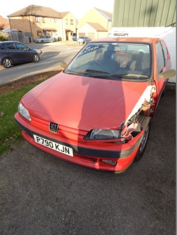 A Peugeot 306, registration P790 KJN, diesel, one key, current mileage 114,497, last MOT 2nd February 2017 expired 2018, red.