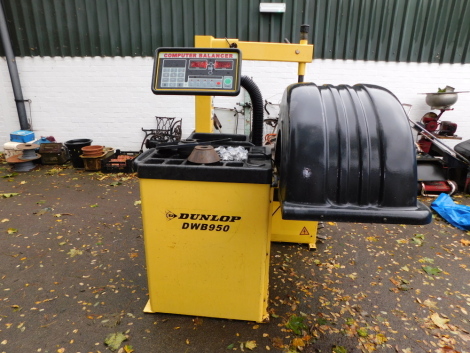 A Dunlop wheel balancer.