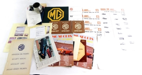 A group of MG ephemera, to include black and white photographs of dinners, MG open day booklets, V&V auction catalogue March 1981, MG wall posters and magazines, metal signs and MG sports magazines, MG Abingdon Jubilee 1979 tankard number 1935 with certif