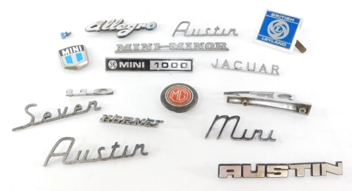 A group of British car badges, to include the Mini 1000, Austin 7, the Allegro MG red enamel badge, the Mini Minor, British Leyland, etc . (a quantity)