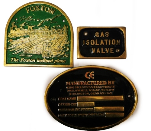 Three brass boat plaques, comprising Foxton 'The Foxton Inclined Plane', together with Gas Isolation Valve brass plaque, and an oval brass boat plaque.