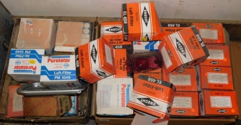 A group No5 of automobilia parts, air filters; Knecht, Purolator and others. (2 boxes)