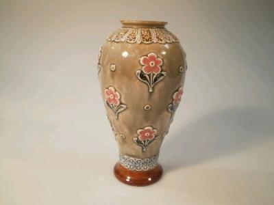 A Lambeth Doulton pottery baluster vase