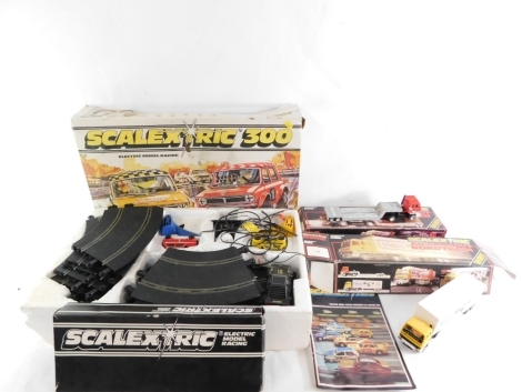 Scalextric 300 Set, Scalextric Juggernaut Road Train, Juggernaut Low Loader and a C-248 hump bridge. (4)