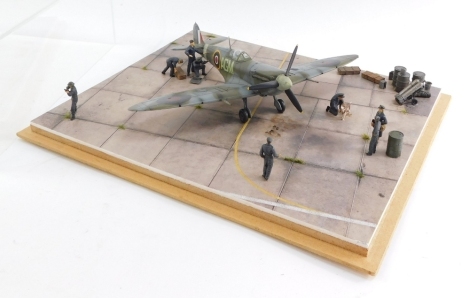 An RAF diorama of a Supermarine Spitfire MKV6, 1:48 scale, with figures in a perspex case.