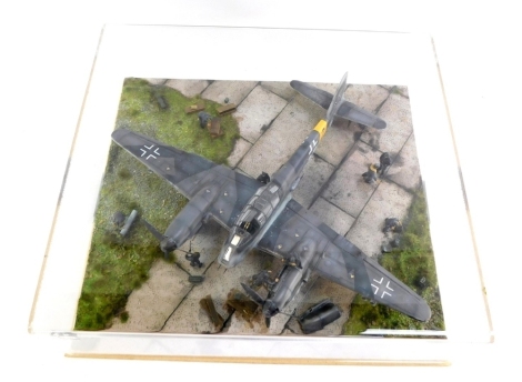 A diorama of a Messerschmitt Me 410B-2/U2/R221/2G 76 Brno Airfield, 1:48 scale, with figures, in a perspex case.