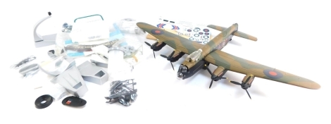 A diecast model of a Lancaster, with accessories and stand, with Royal Lancaster badge.