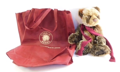 A Charlie Bear David, bear with bell, product code CB194554, with red Charlie bag carry case.