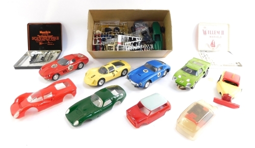 Scalextric cars and car parts, to include Tri-ang Scalextric Ferrari GT 250 Berlinetta, yellow Scalextric racing car number 9, red Scalextric Ferrari number 30, and an Atlas Scalextric crane, together with various bodies and parts. (a quantity)