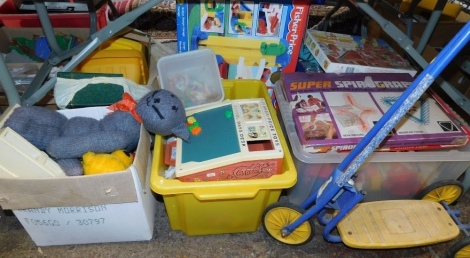 Toys and games, to include a Fisher Price School Days desk, knitted toys, Fisher Price dumper truck, scooter, Super Spirographs, etc. (all under 1 table)