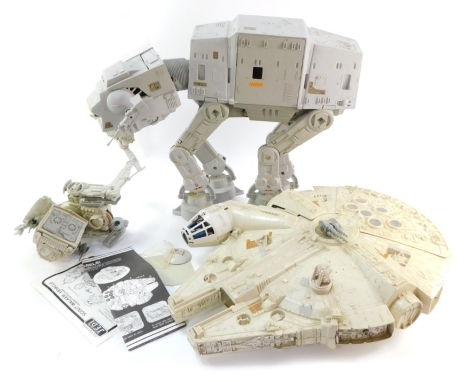 Star Wars figures, comprising a Scout Walker vehicle, Millennium Falcon AT-ST and an ATAT Imperial Walker. (3)