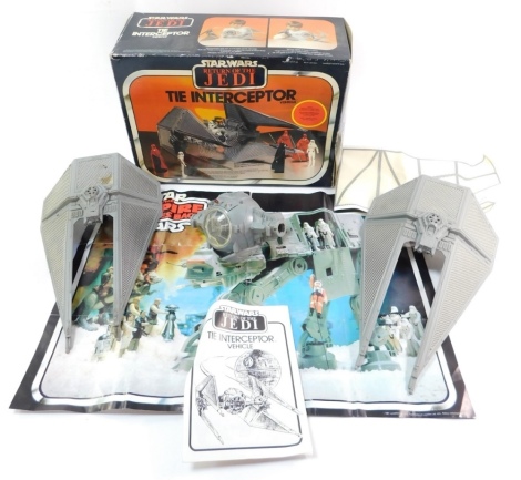 A Star Wars Return of The Jedi Tie Interceptor vehicle, boxed.