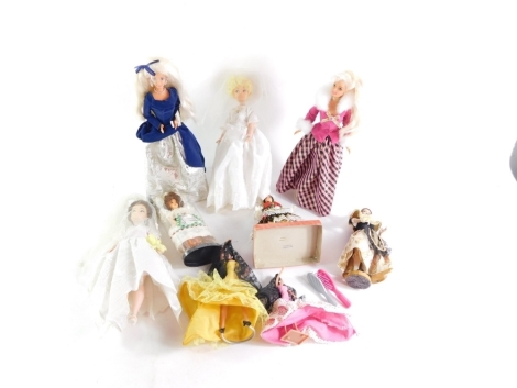 A group of dolls, two Barbies in evening dress, Eastern dolls, etc. (1 box)