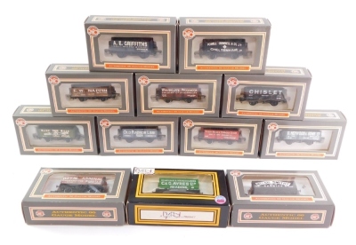 Dapol 00 gauge rolling stock, including limited edition G. Heywood & Sons seven plank wagon, seven plank wagon by Osborn Models, Bliss Tweed Mills seven plank wagon etc (12).