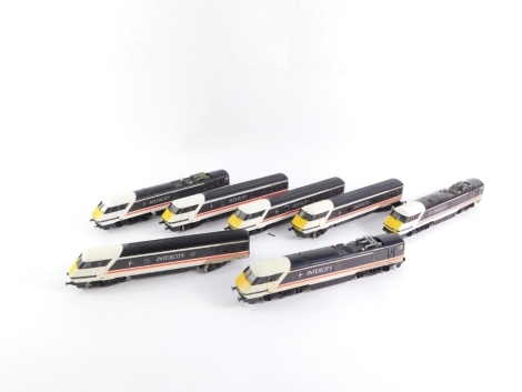 Three Hornby OO gauge class 91 '91014' power cars, and three 82205 dummy power cars BR Swallow livery. (1 tray)