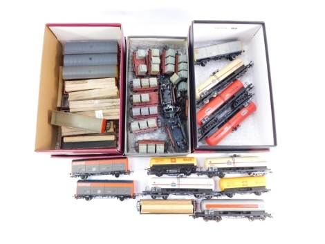 Hornby and other OO gauge rolling stock, including tankers, box vans, conflats and loads, Railfrieght box vans, etc. (3 boxes)